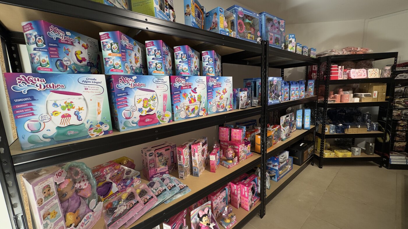 Colourful toy shelves inside the real PlayCraft shop